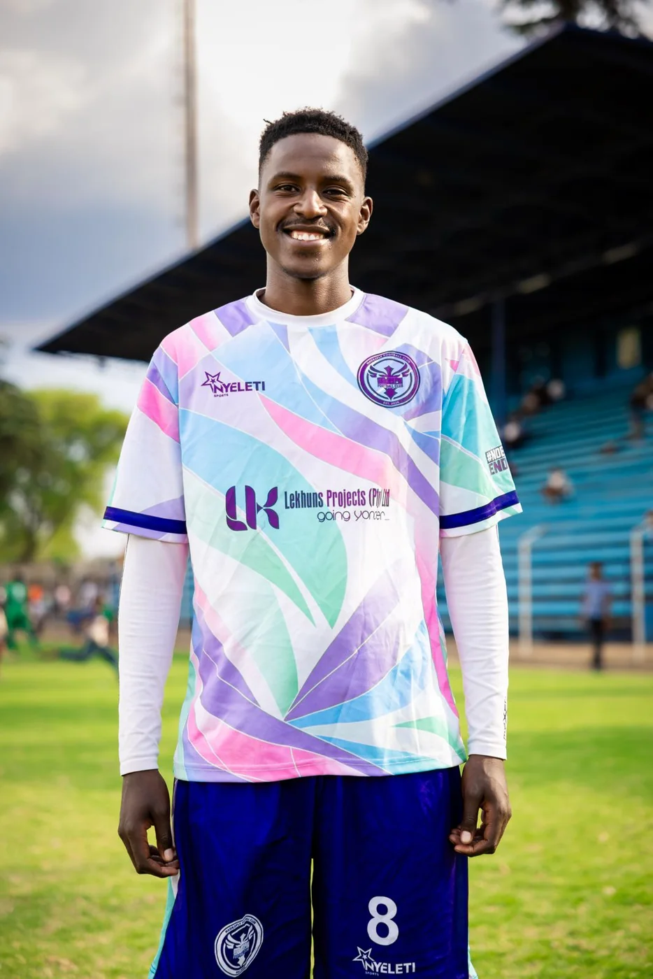 A Made2Fly FC player in the Tembisa Funk T-shirt at the stadium